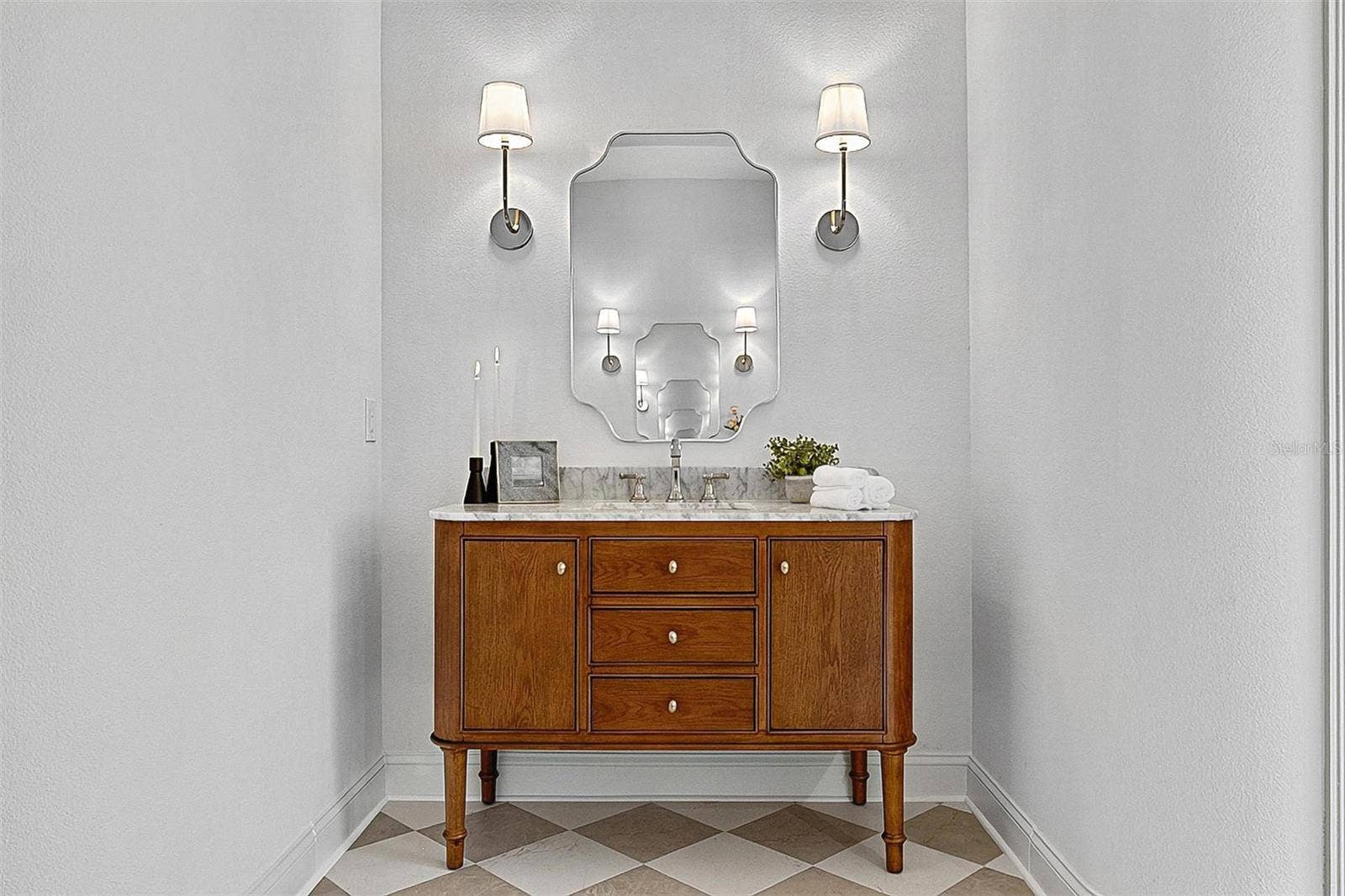 17 GRANDVIEW DRIVE, Palm Coast, FL 32137 Master Bathroom mens stone top and wood cabinetvanity
