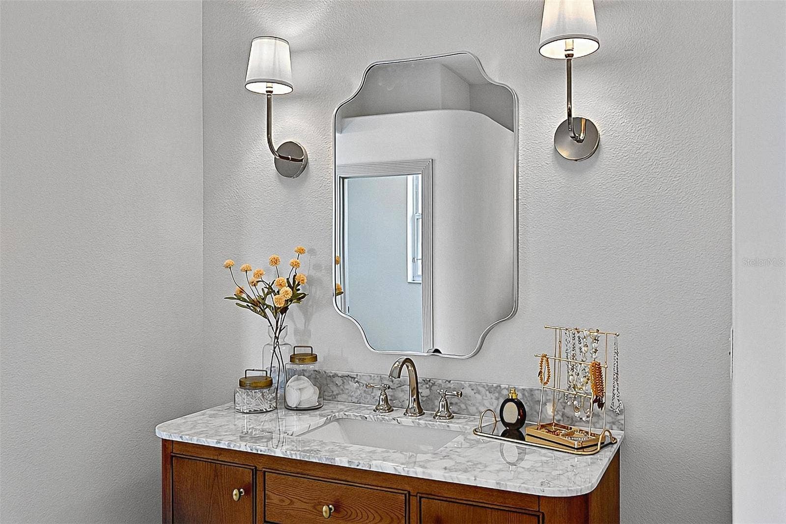 17 GRANDVIEW DRIVE, Palm Coast, FL 32137 Master Bathroom with wood side ladies stone top with wood vanity