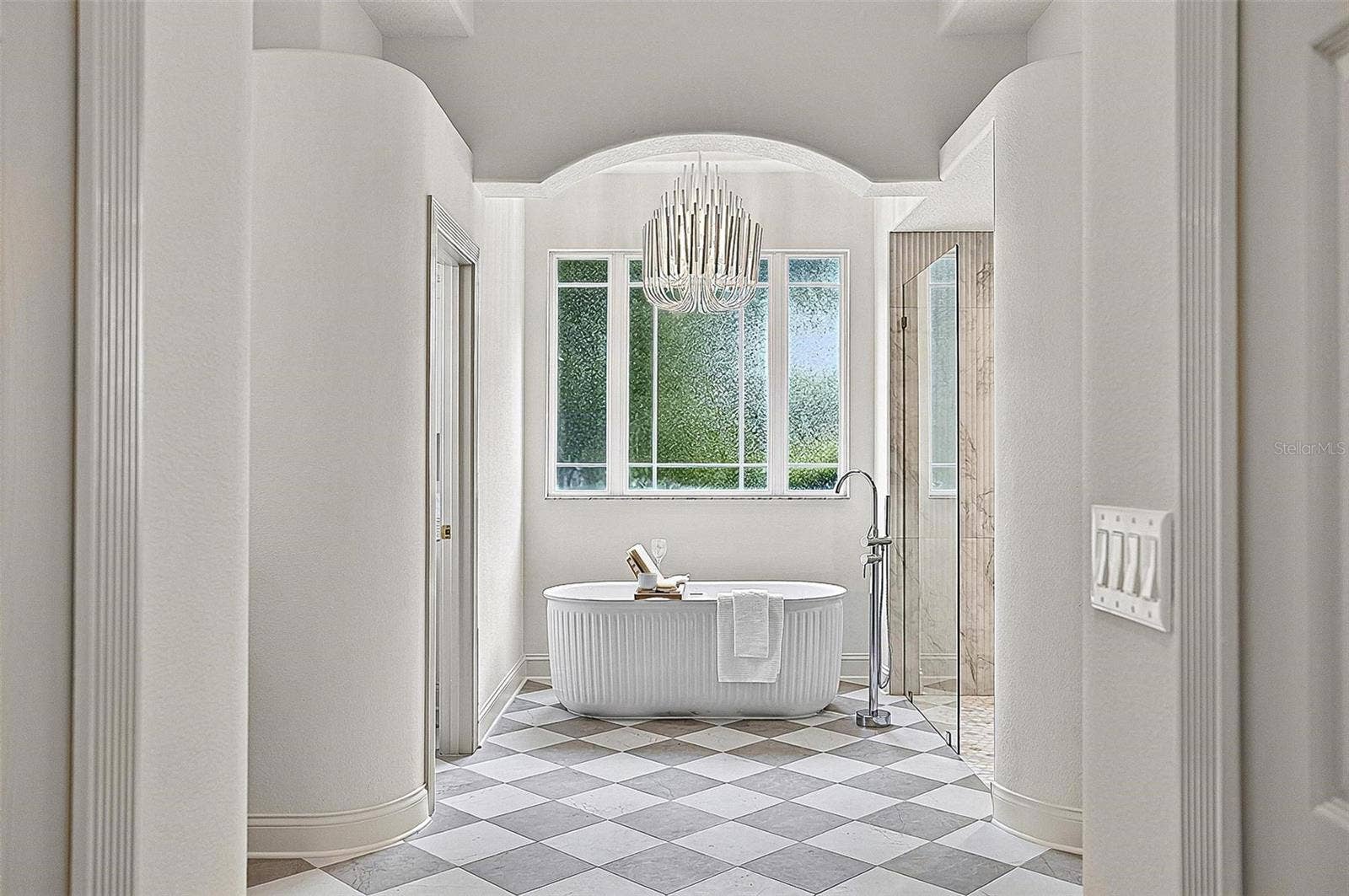 17 GRANDVIEW DRIVE, Palm Coast, FL 32137 Looking like an upscale magazine, this formal Master Bath gives all the spa vibes