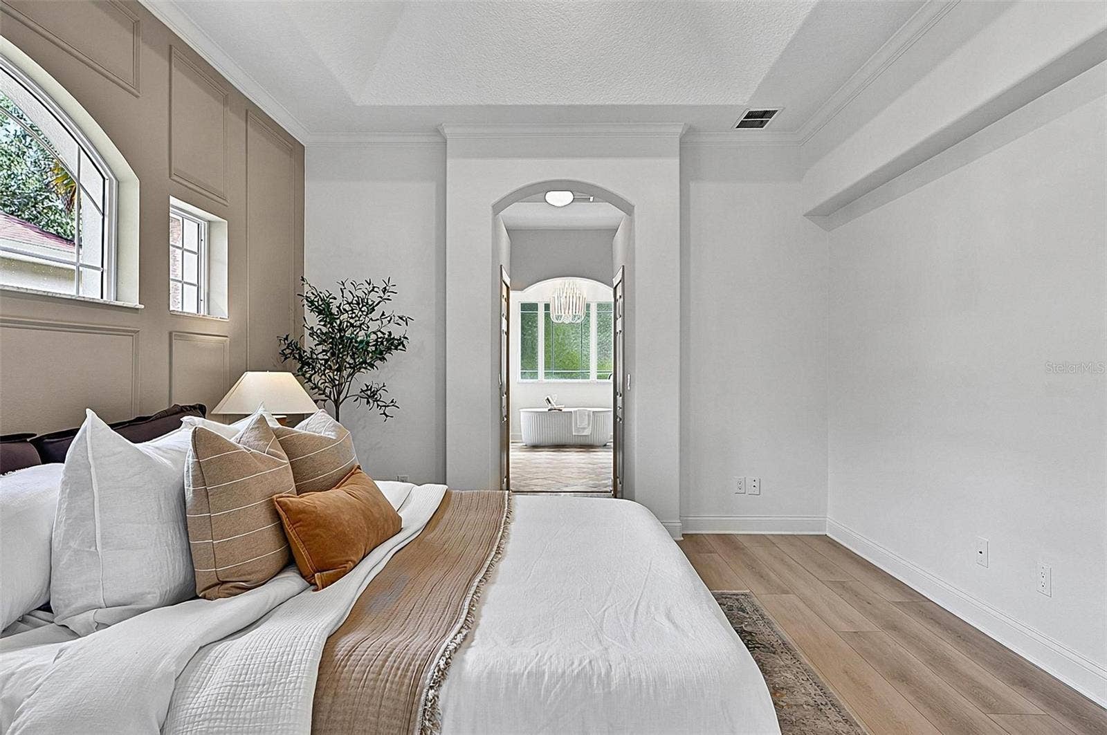 17 GRANDVIEW DRIVE, Palm Coast, FL 32137 A piece of heaven in the Master Bedroom Retreat with transient window bringing in natural light. Sliders go out to the solarium and into stunning Master Bath Retreat