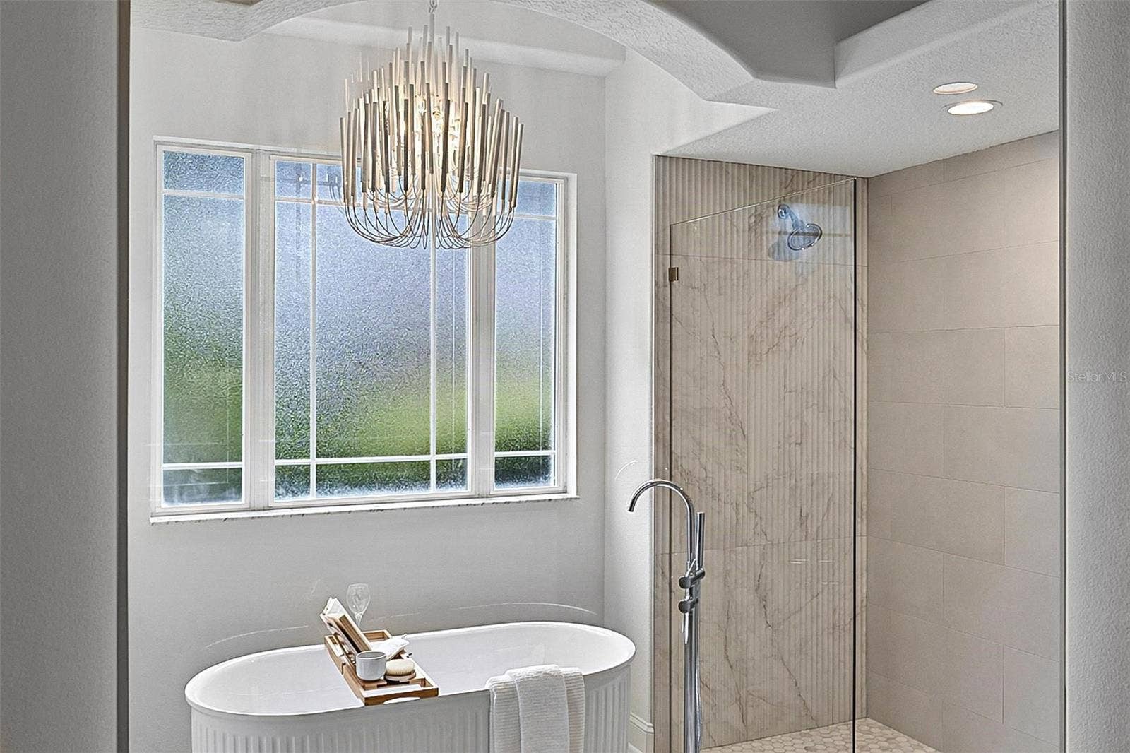 17 GRANDVIEW DRIVE, Palm Coast, FL 32137 Beautiful chandelier drops over the free standing tub for a nightime spa glow