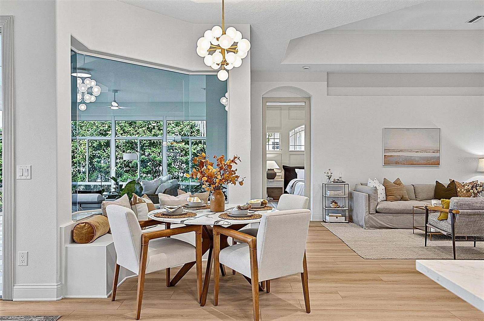 17 GRANDVIEW DRIVE, Palm Coast, FL 32137 Beautiful Breakfast nook with custom window seating looking our to solarium and righ off formal living room