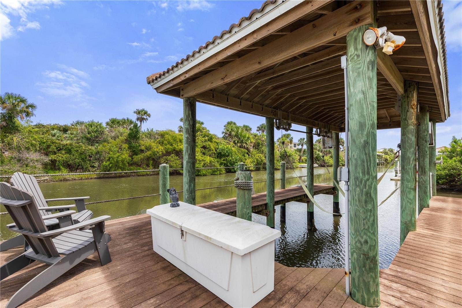 And heres the reward at the end of the pathyour own dock on the canal, where morning coffee, an afternoon on the boat, or simply watching the water can become part of the day.