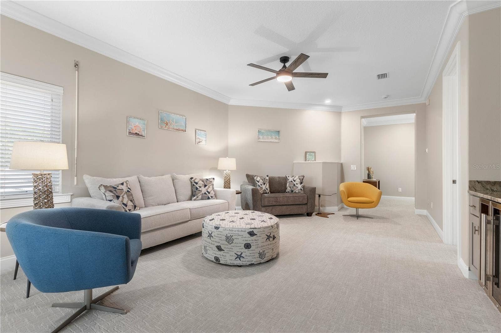 Upstairs opens to a whole new side of the homea roomy game room where the fun can take over and everyone can claim their favorite spot.