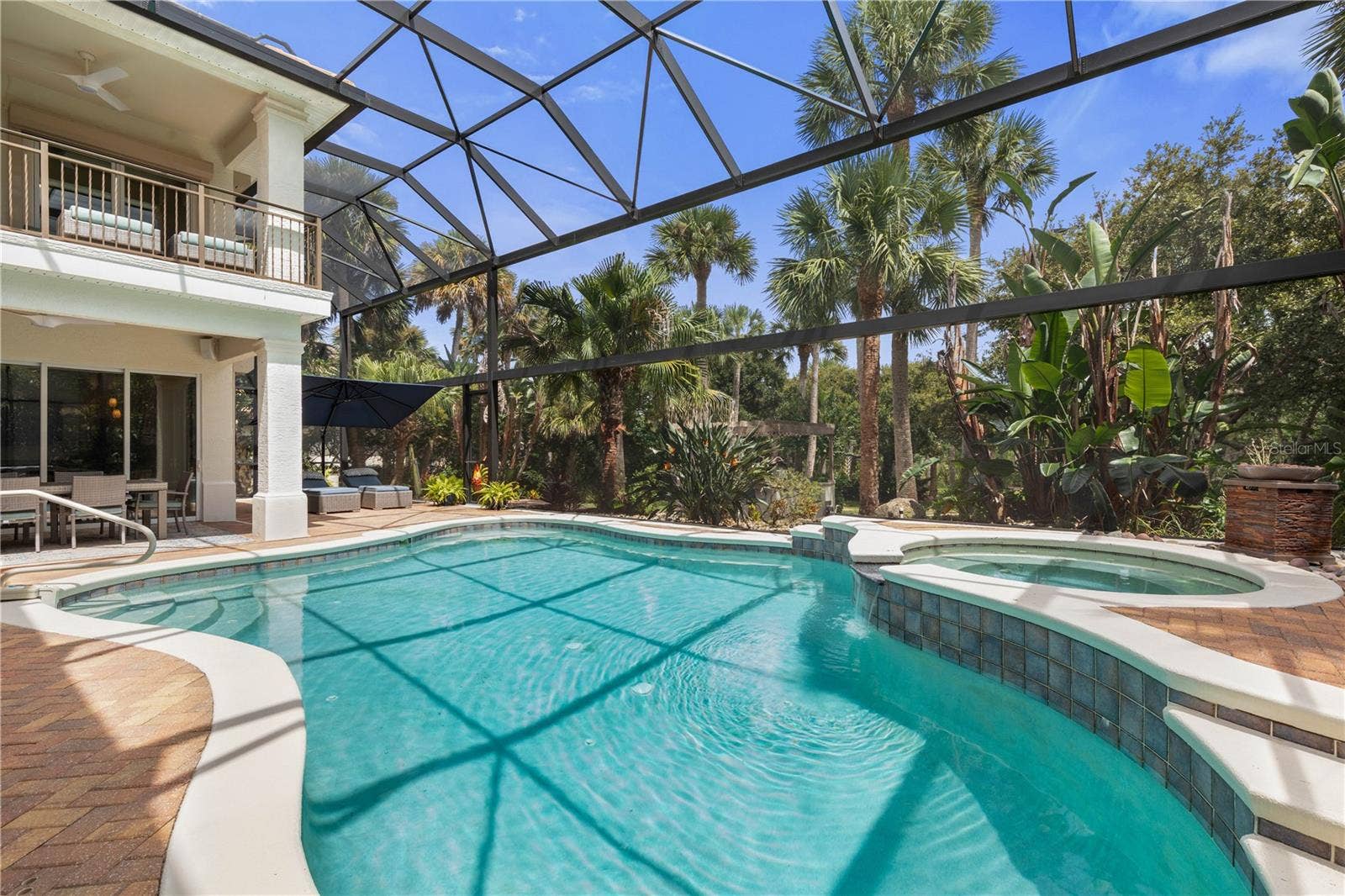 A private resort experience awaits in your own backyard, where the sparkling pool and spa are wrapped in lush seclusionmade for long afternoons in the water and evenings under the stars.