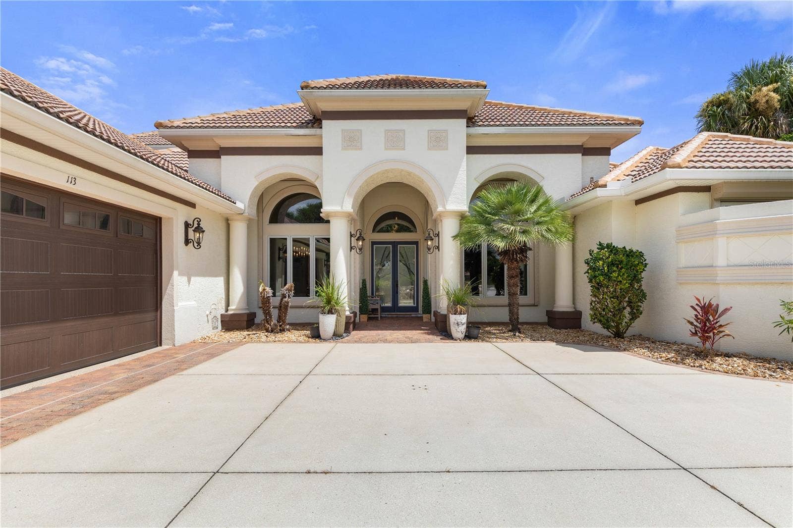 Welcome to 113 Island Estates Pkwycome on in and discover the exceptional lifestyle waiting just beyond the front door.
