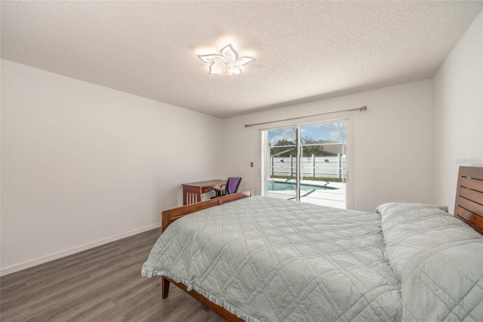 plenty of room for 2 dressers in this primary bedroom