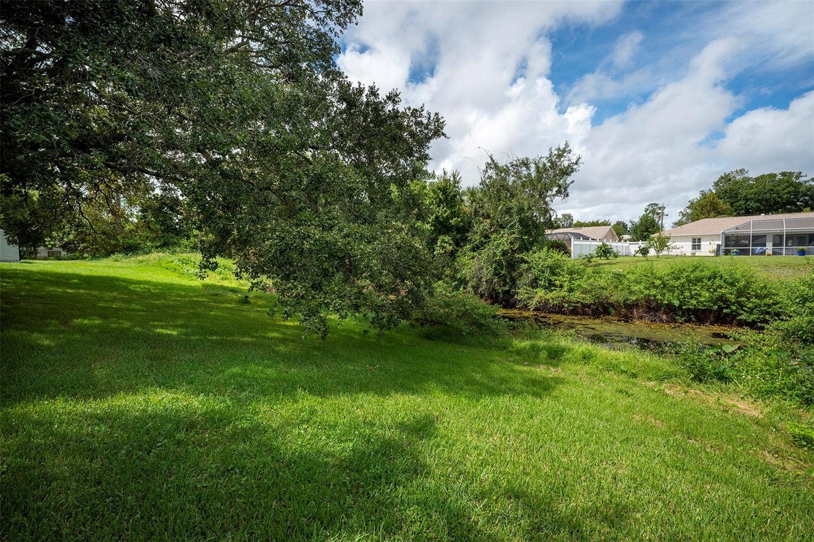 83 FARRAGUT DRIVE, Palm Coast, FL 32137 Back of property near canal's edge