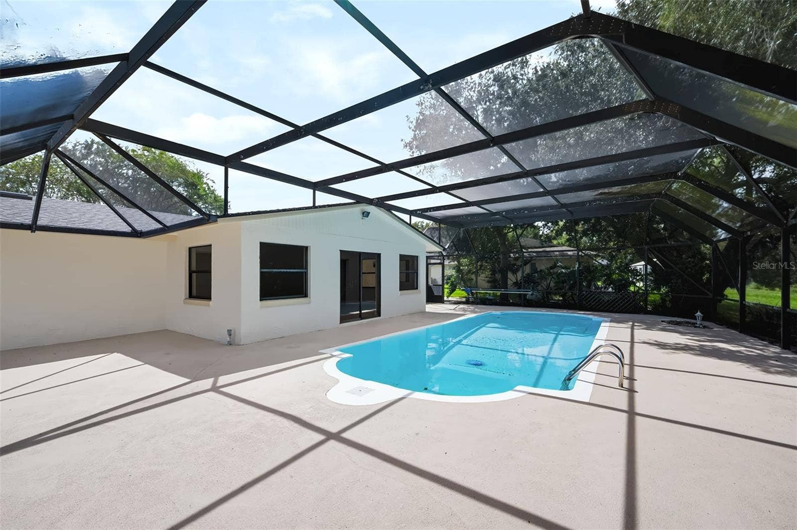 83 FARRAGUT DRIVE, Palm Coast, FL 32137 Another view from back of the enclosed lanai