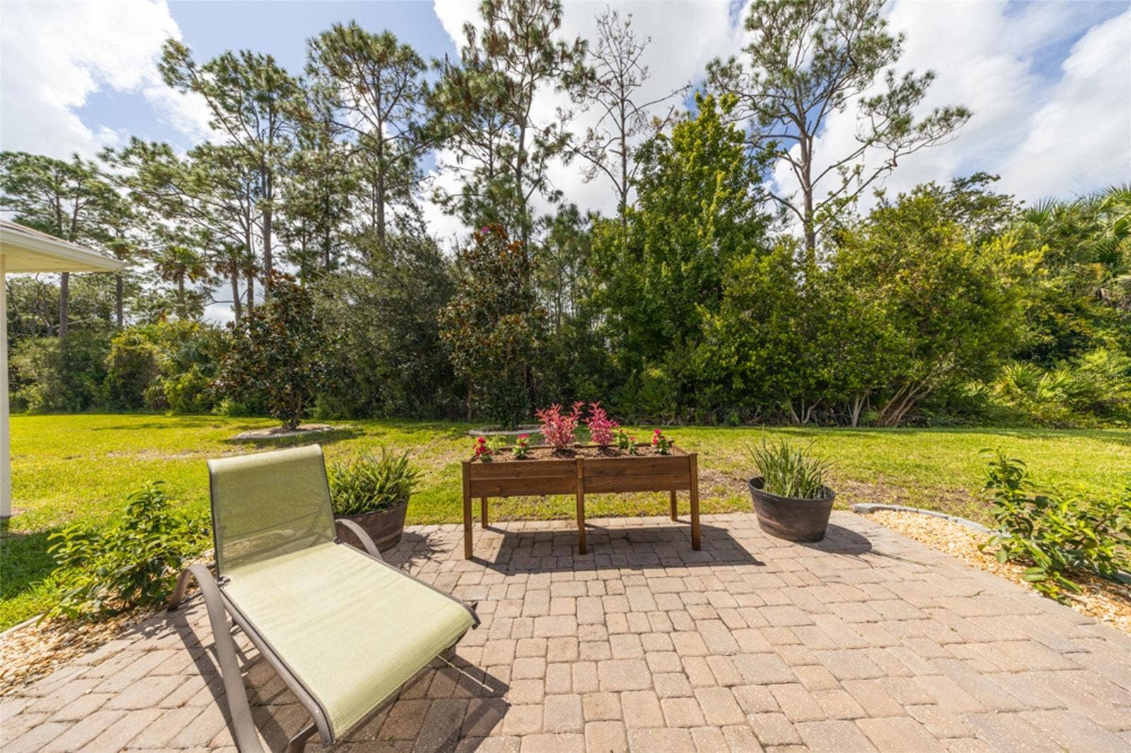 Extended patio with pavers
