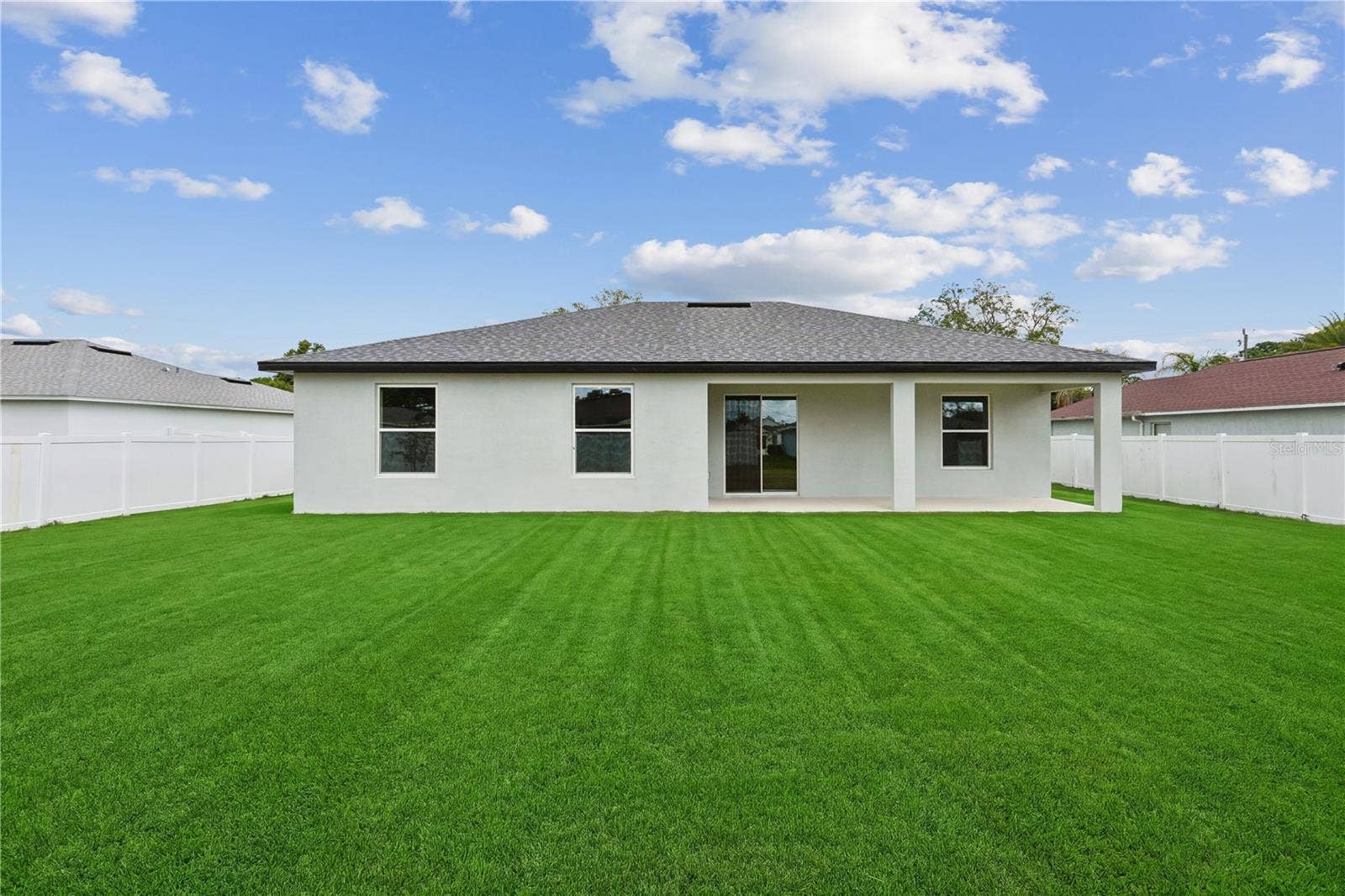 68 LAKE SUCCESS DRIVE, Palm Coast, FL 32137 Photo is of a completed model; actual colors and finishes may vary.