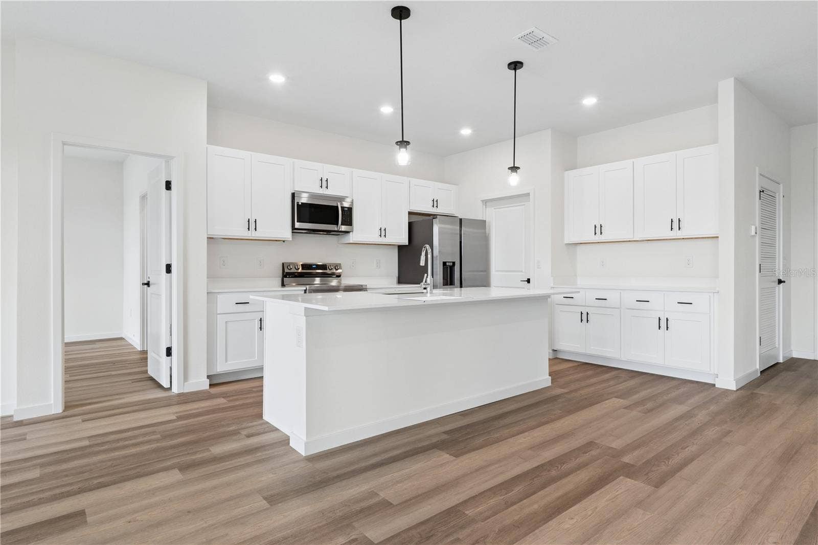 68 LAKE SUCCESS DRIVE, Palm Coast, FL 32137 Photo is of a completed model; actual colors and finishes may vary.