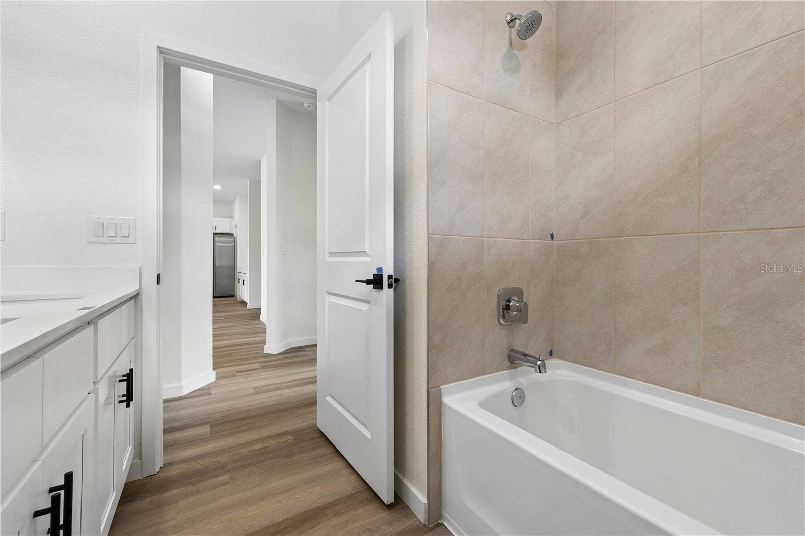 68 LAKE SUCCESS DRIVE, Palm Coast, FL 32137 Photo is of a completed model; actual colors and finishes may vary.