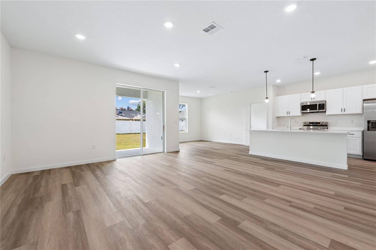 68 LAKE SUCCESS DRIVE, Palm Coast, FL 32137 Photo is of a completed model; actual colors and finishes may vary.