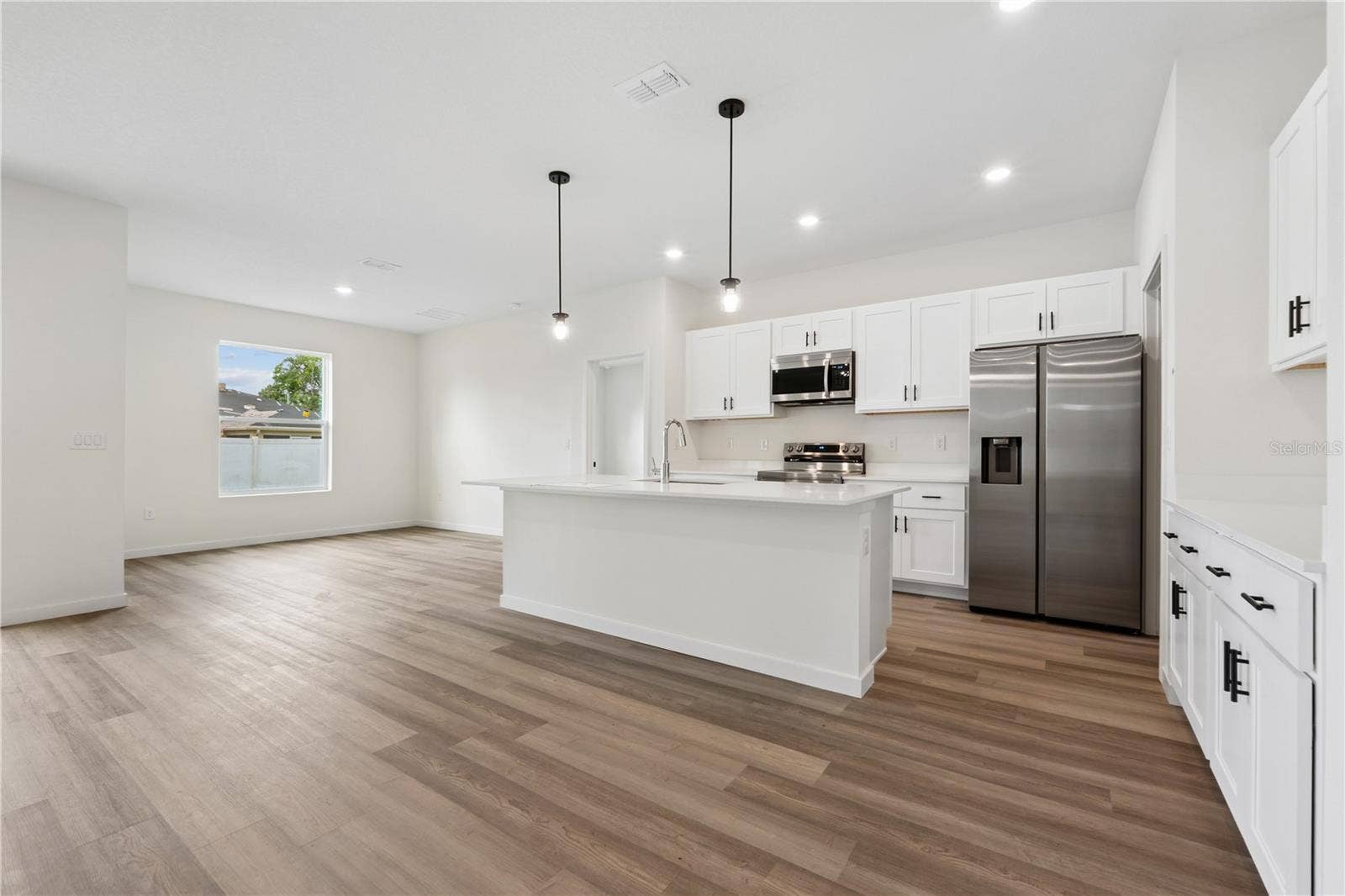 68 LAKE SUCCESS DRIVE, Palm Coast, FL 32137 Photo is of a completed model; actual colors and finishes may vary.