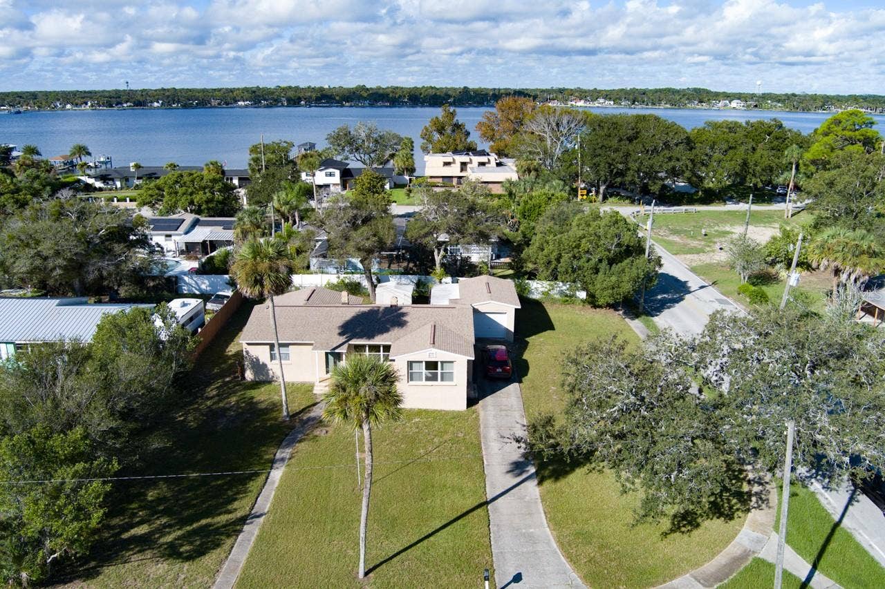 374 PINE ROAD, Ormond Beach, FL 32176 Front of home showing location to Halifax River
