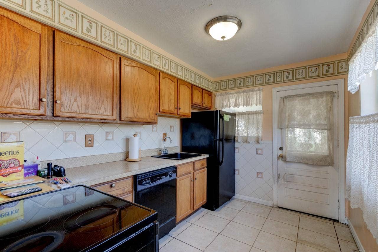 374 PINE ROAD, Ormond Beach, FL 32176 Kitchen with separate entry near garage