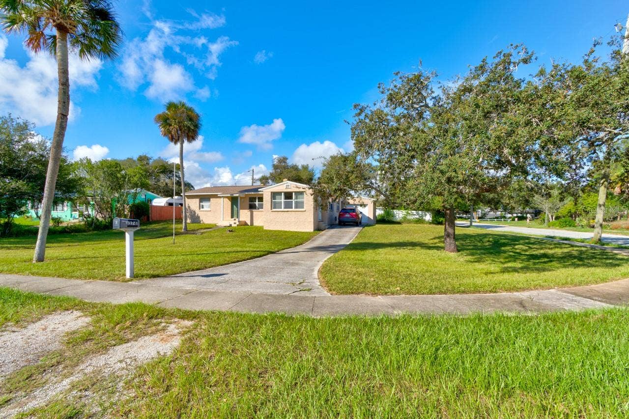 374 PINE ROAD, Ormond Beach, FL 32176 Front and side of home on large corner lot