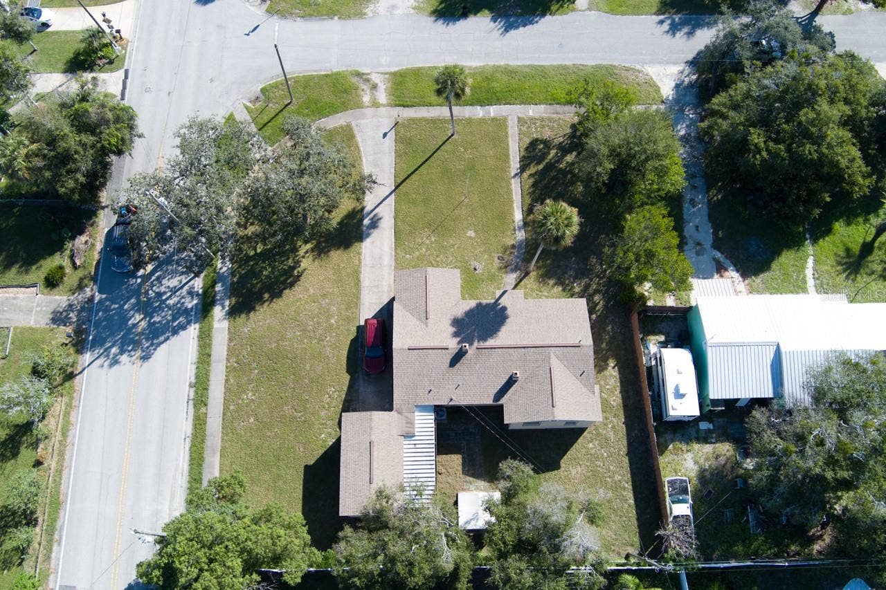 374 PINE ROAD, Ormond Beach, FL 32176 Aerial view of roof and property