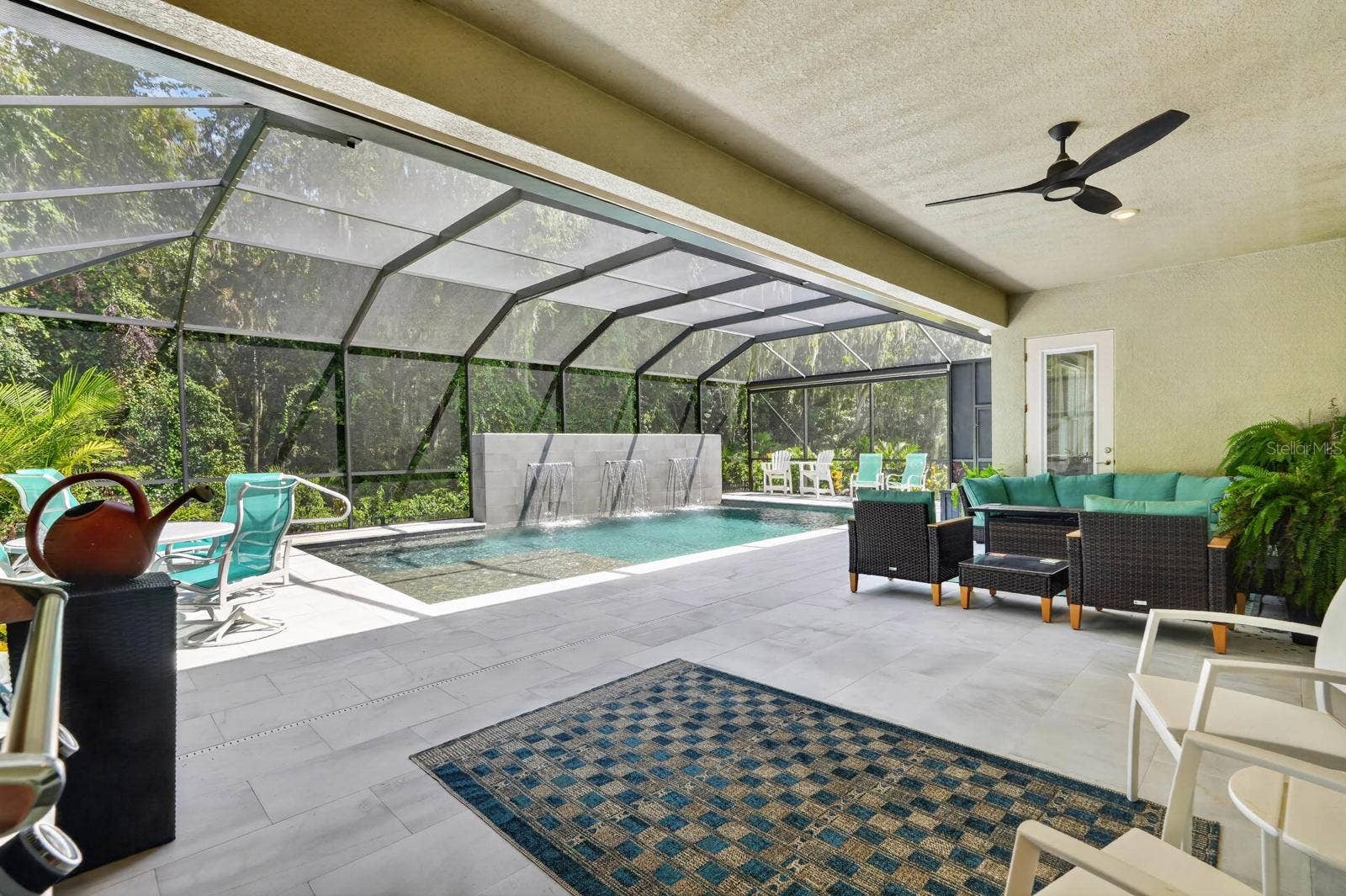 36 NEW WATER OAK DRIVE, Palm Coast, FL 32137 Large covered lanai overlooks stunning pool
