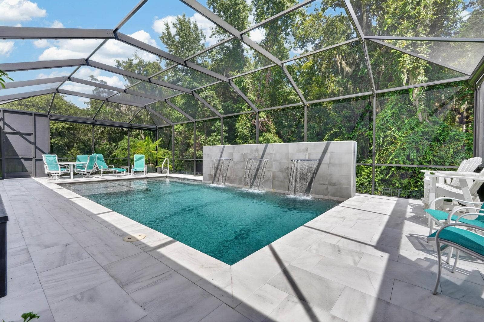 36 NEW WATER OAK DRIVE, Palm Coast, FL 32137 pool surround is a sealed marble surface that stays cool on the feet