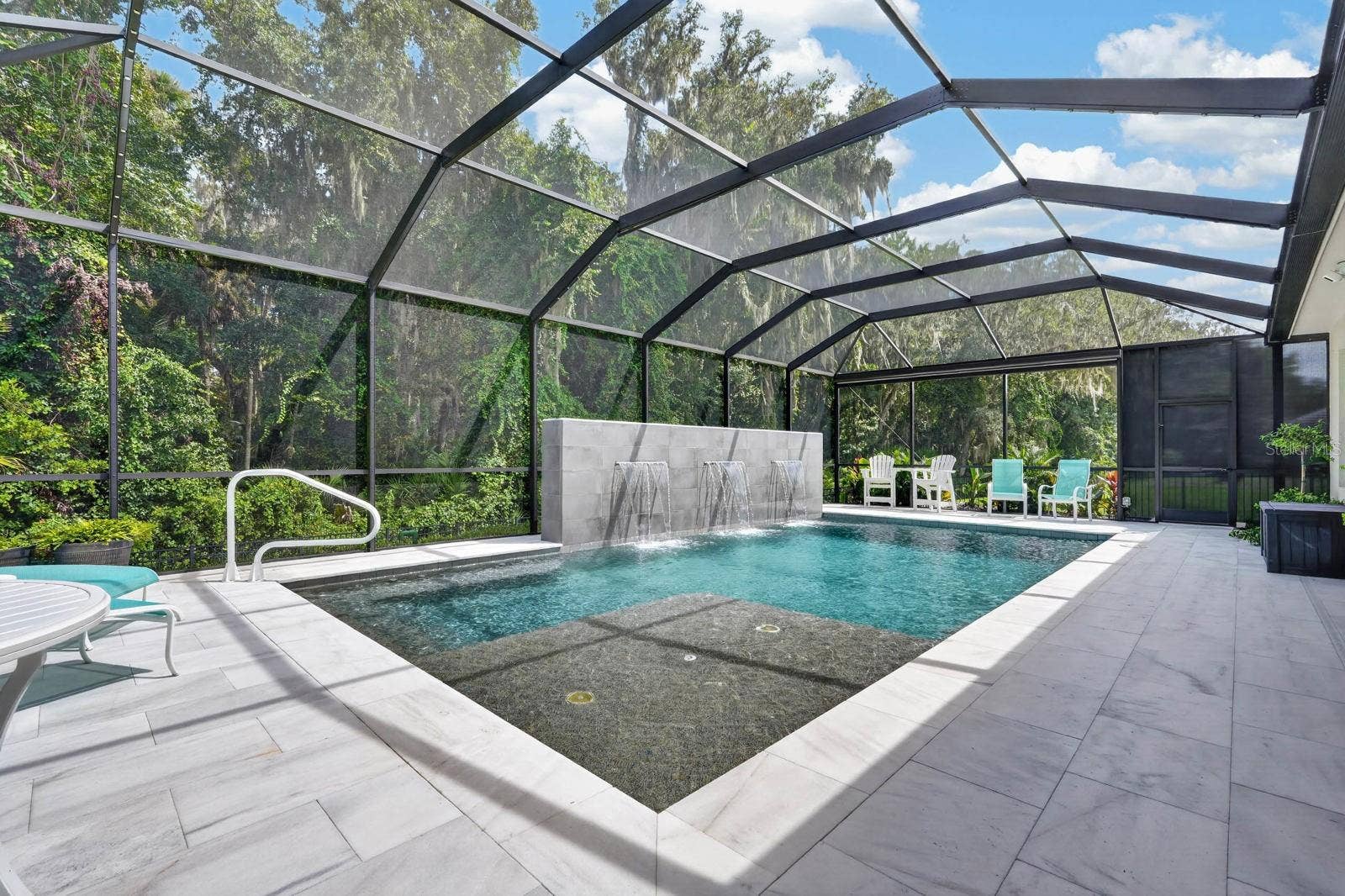 36 NEW WATER OAK DRIVE, Palm Coast, FL 32137 Saltwater heated pool has a sundeck, spa with jets and a 6.5 foot deep end