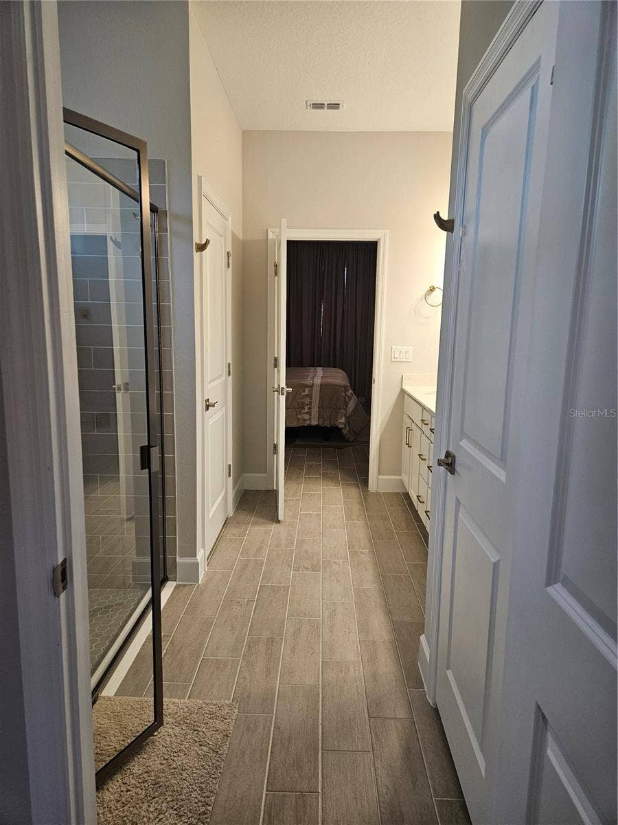 74 UHL PATH, Palm Coast, FL 32164 main bedroom to bathroom