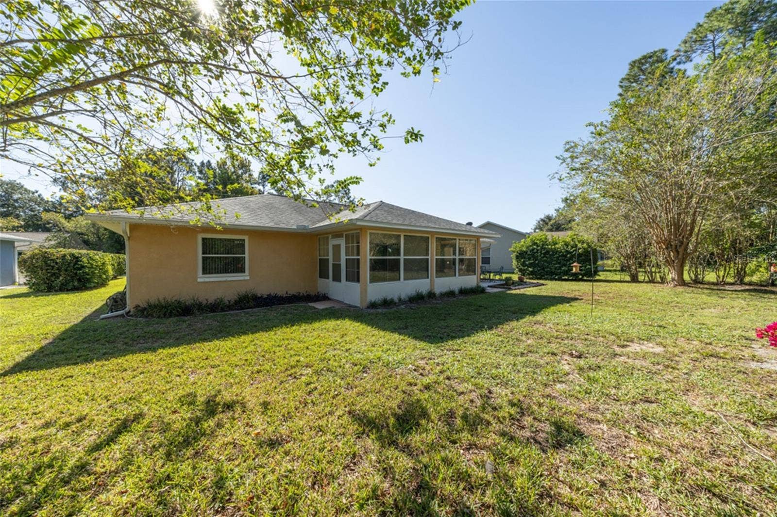 141 BREN MAR LANE, Palm Coast, FL 32137 Florida room has 2 doors - one to the yard and one to the paver patio