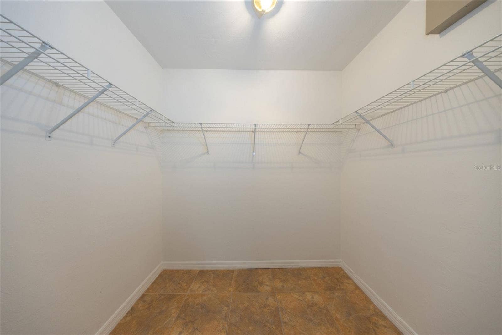 141 BREN MAR LANE, Palm Coast, FL 32137 Primary bedroom has large walk in closet