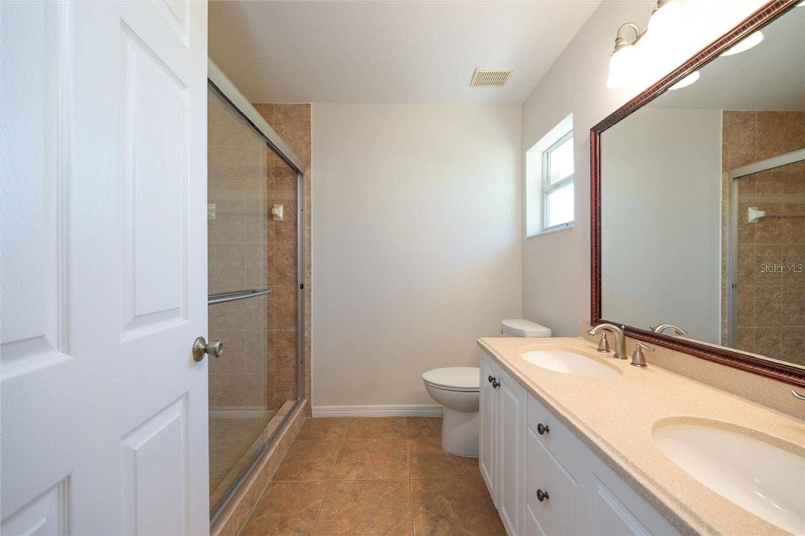 141 BREN MAR LANE, Palm Coast, FL 32137 Primary bath has dual vanities and updated shower.