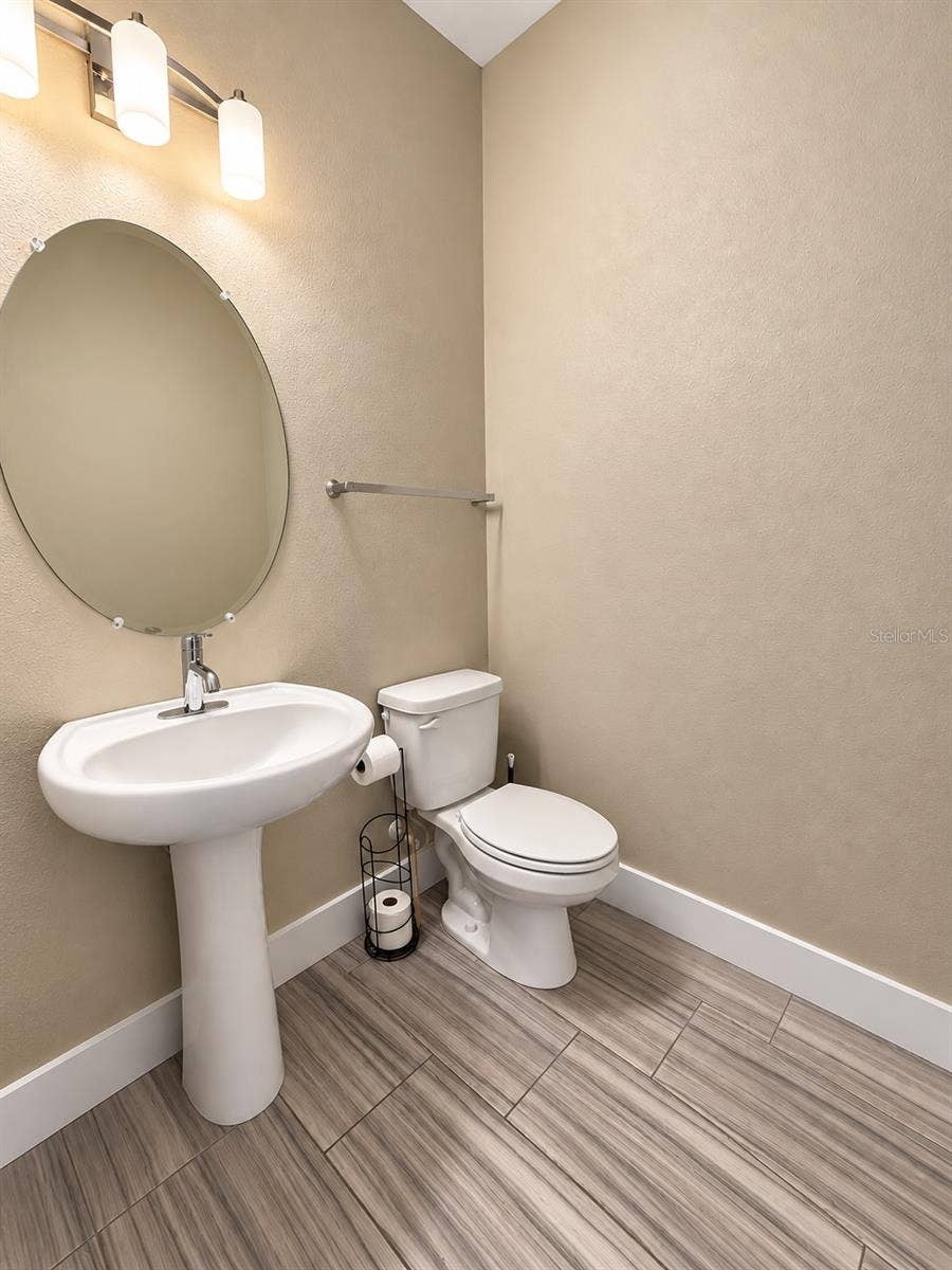 8734 WINNING FIELDS ROAD, New Port Richey, FL 34655 downstairs half bath