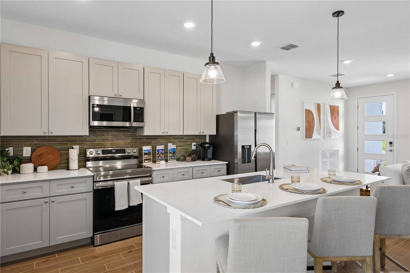 106 RAMBLEWOOD DRIVE, Palm Coast, FL 32164 Photo of completed model; actual finishes and colors may vary