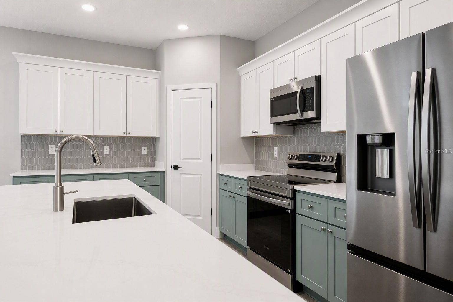 18 ZORLOU COURT, Palm Coast, FL 32164 Photo is of a completed model; actual finishes and colors may vary
