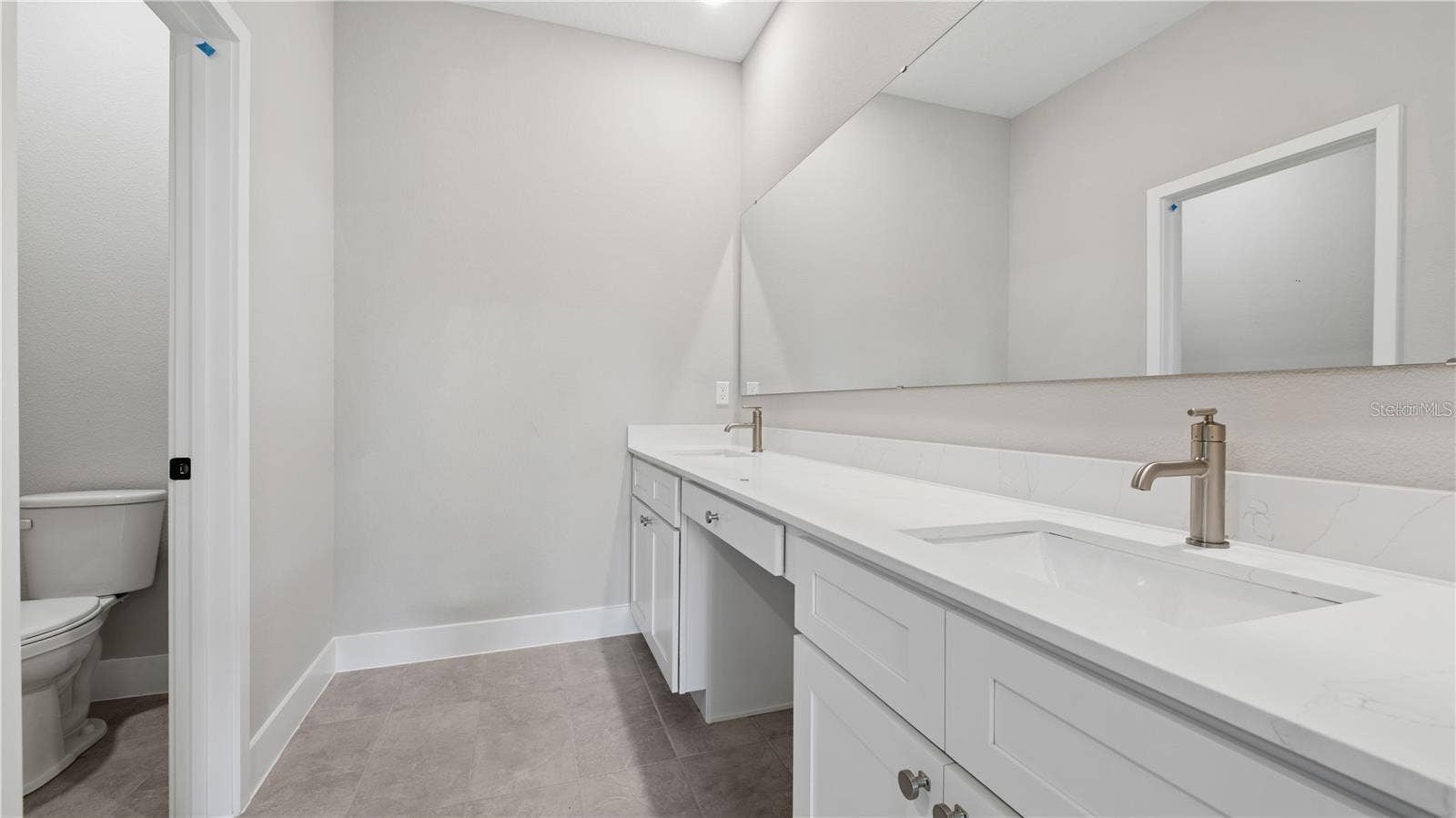 18 ZORLOU COURT, Palm Coast, FL 32164 Photo is of a completed model; actual finishes and colors may vary