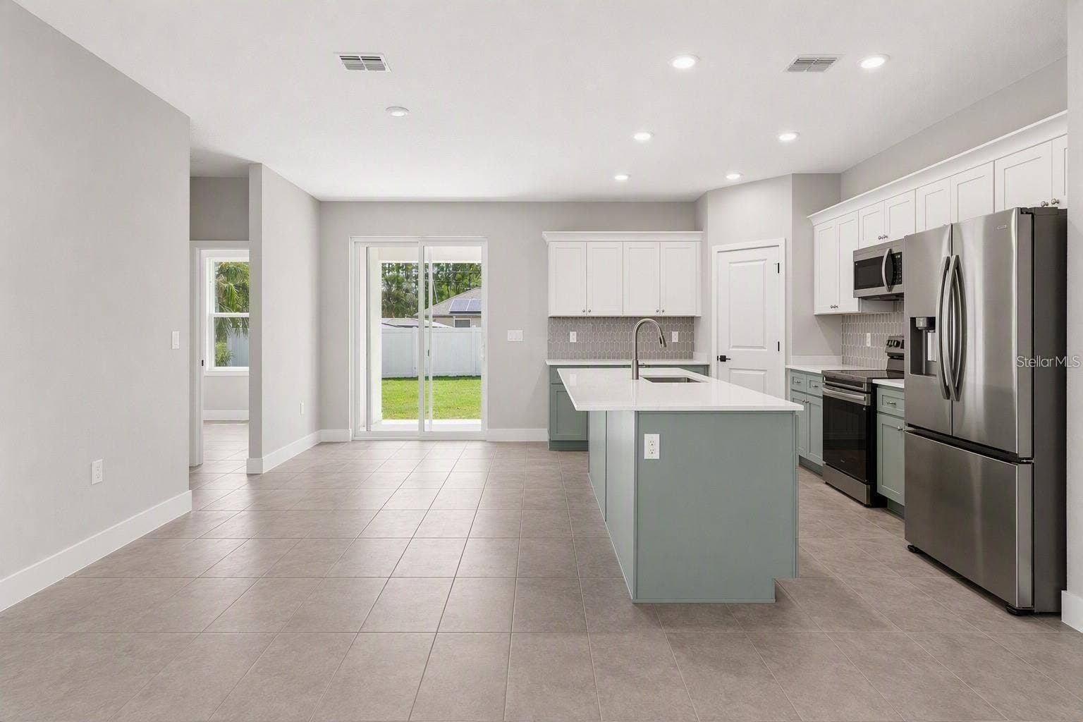 18 ZORLOU COURT, Palm Coast, FL 32164 Photo is of a completed model; actual finishes and colors may vary