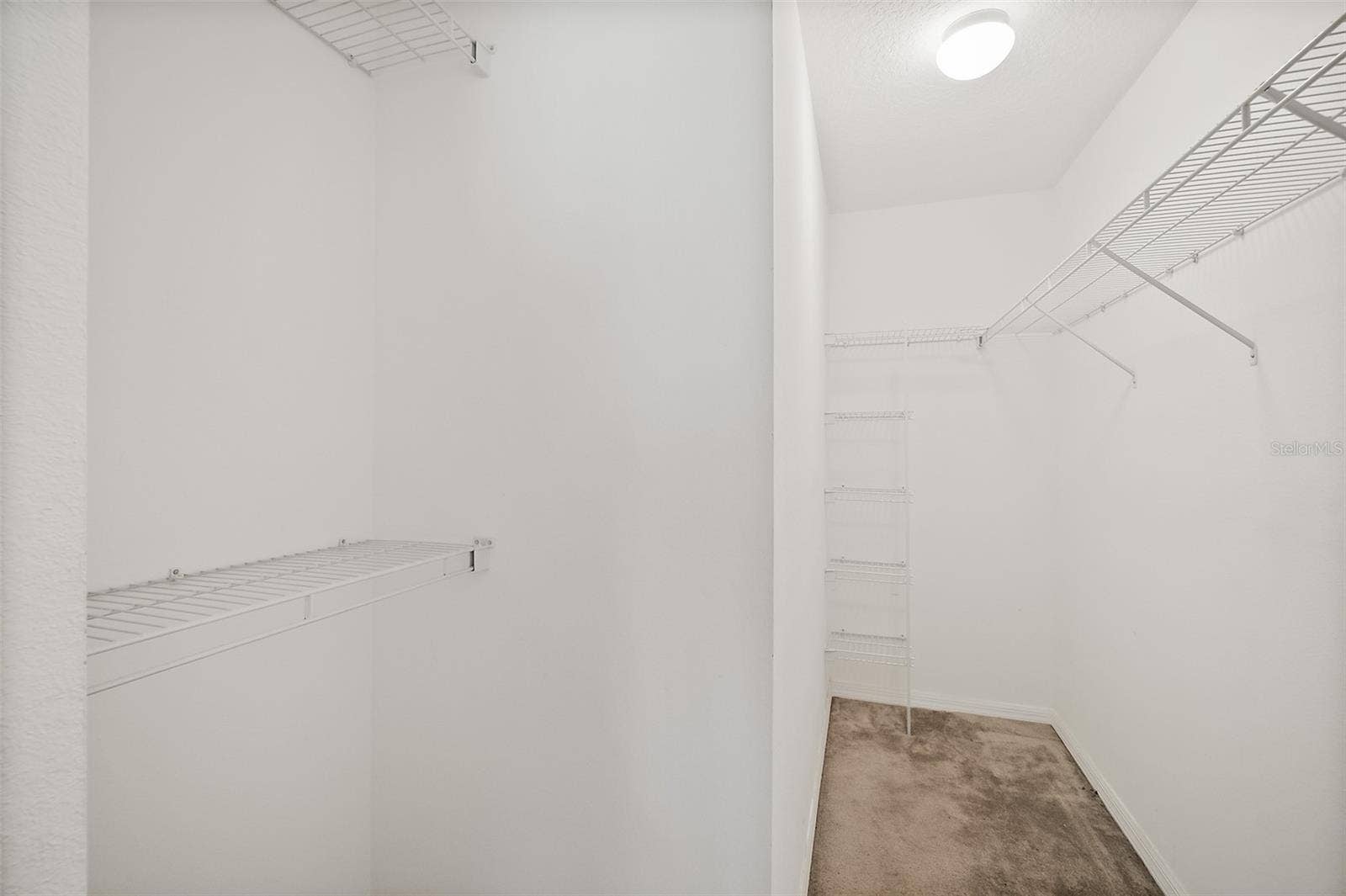 Primary Suite Walk in Closet