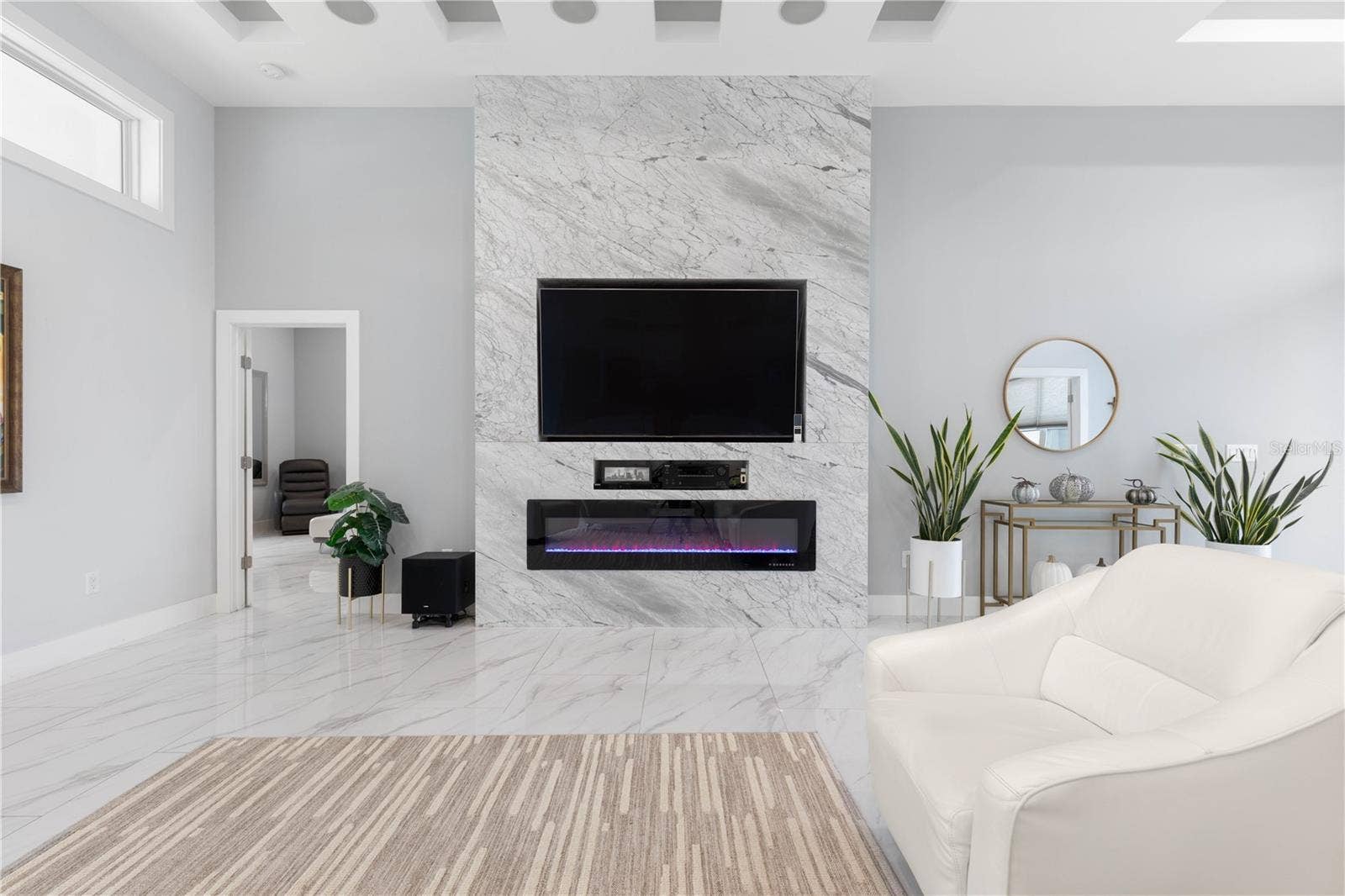 2 ROBIN PLACE, Palm Coast, FL 32164 Electric fireplace lined up marble