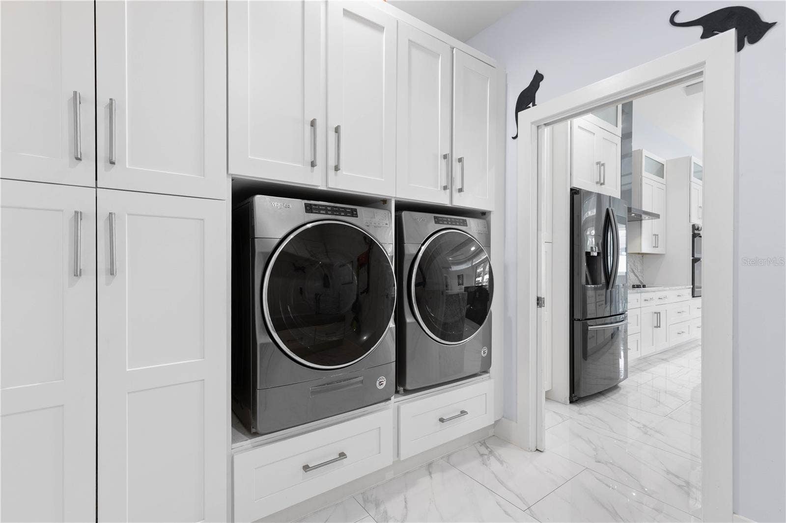 2 ROBIN PLACE, Palm Coast, FL 32164 Laundry room with washer and dryer included