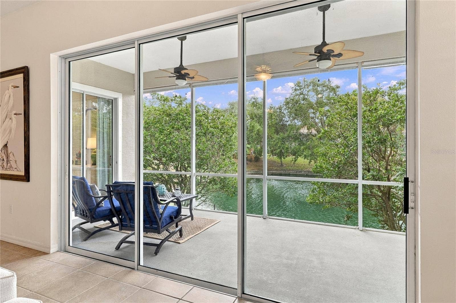 Triple sliders that lead to large screened in lanai