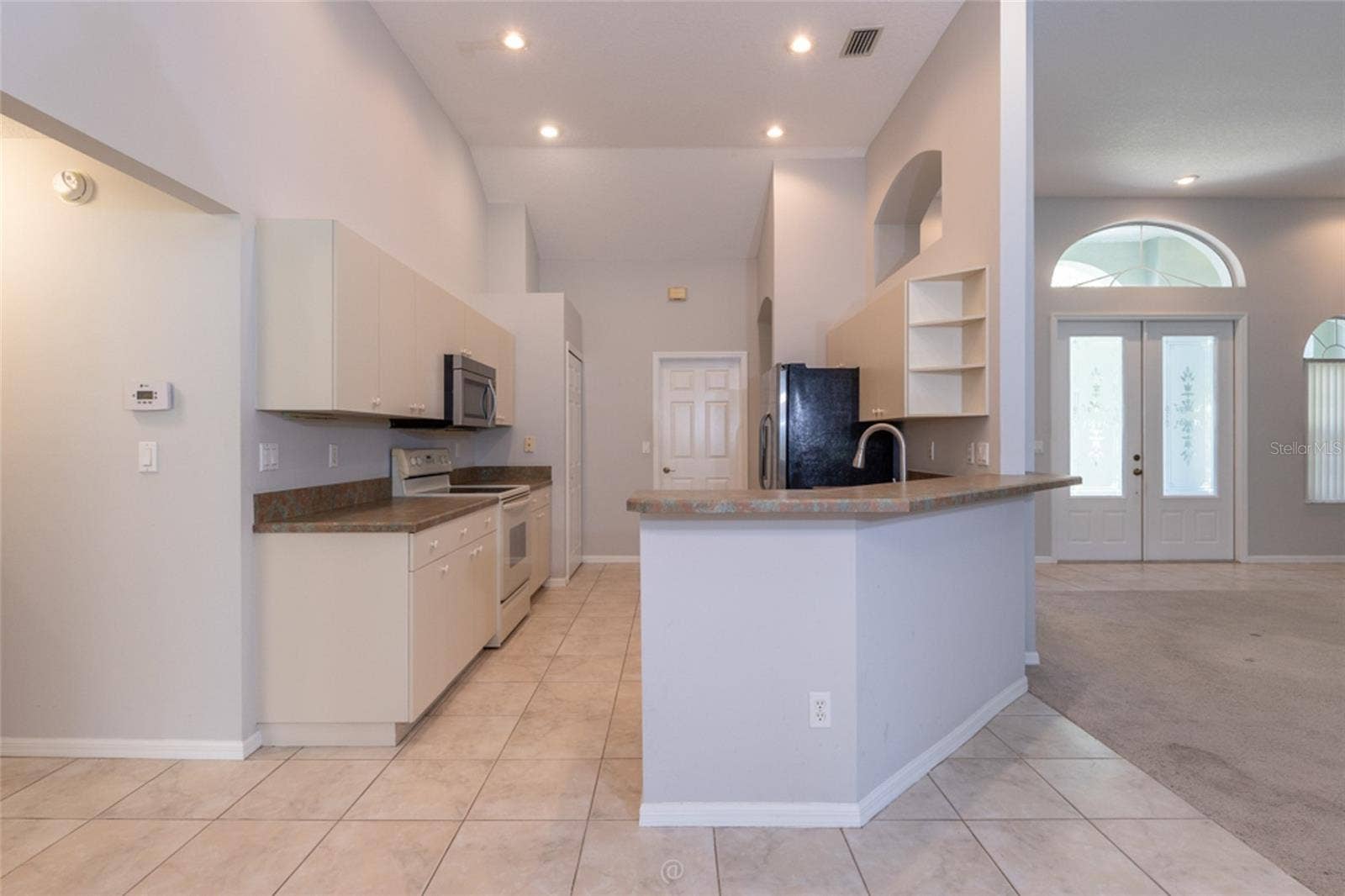 3755 CARRICK DRIVE, Ormond Beach, FL 32174 View into kitchen