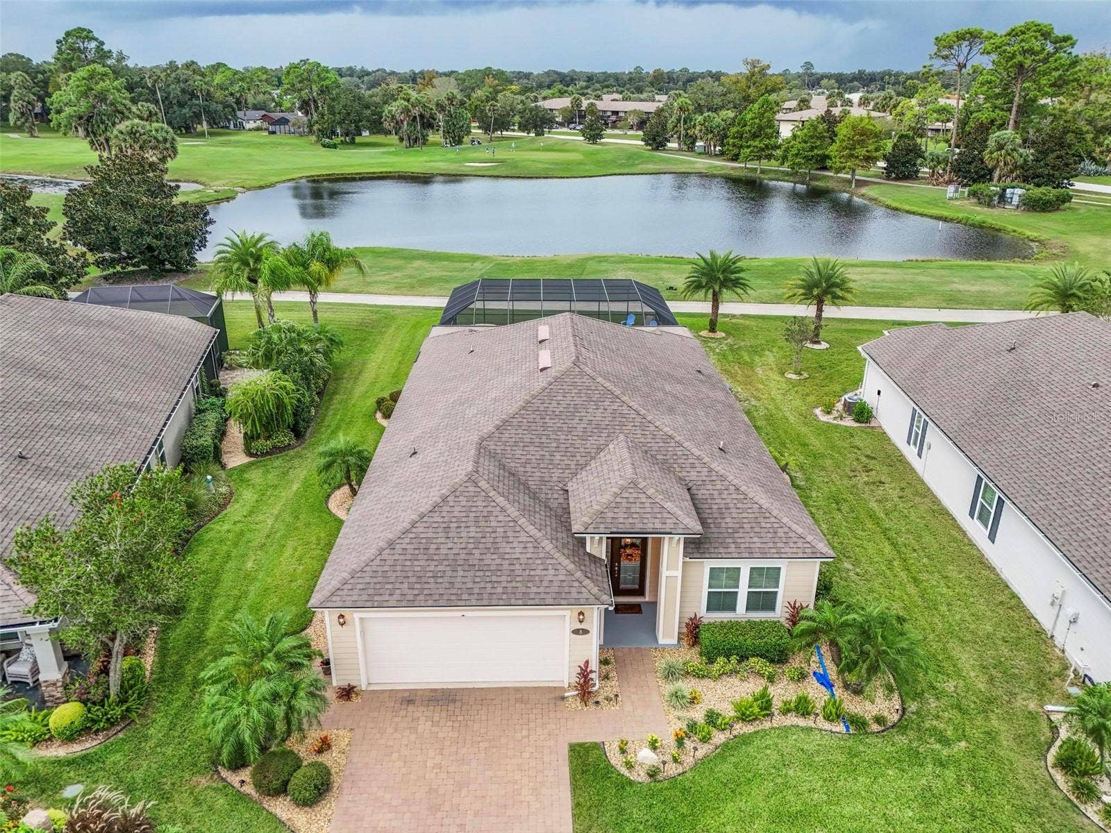 8 COUNTRY CLUB HARBOR CIRCLE, Palm Coast, FL 32137 Aerial view to pond and golf course