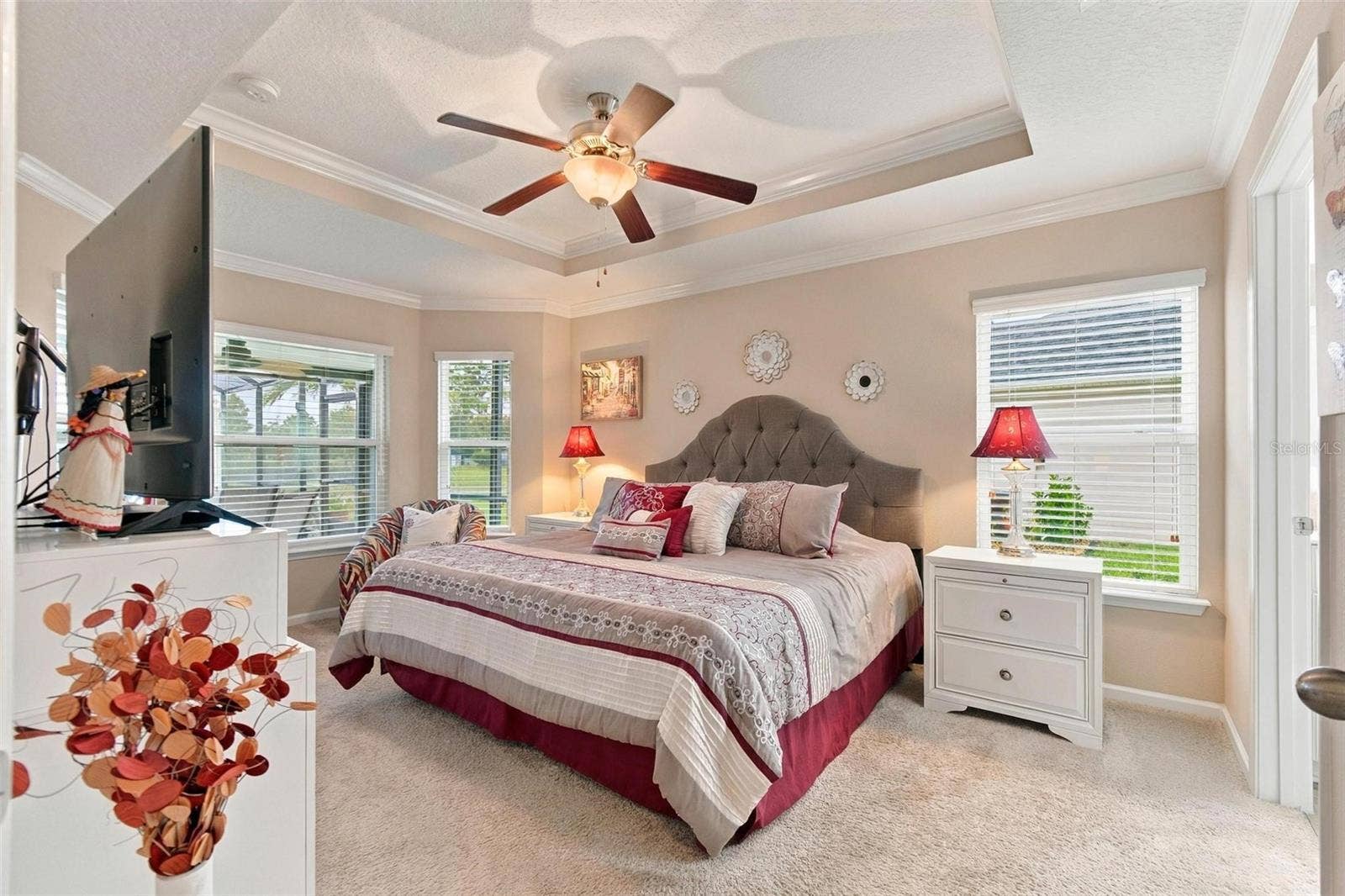 8 COUNTRY CLUB HARBOR CIRCLE, Palm Coast, FL 32137 Primary bedroom 1 with tray ceiling