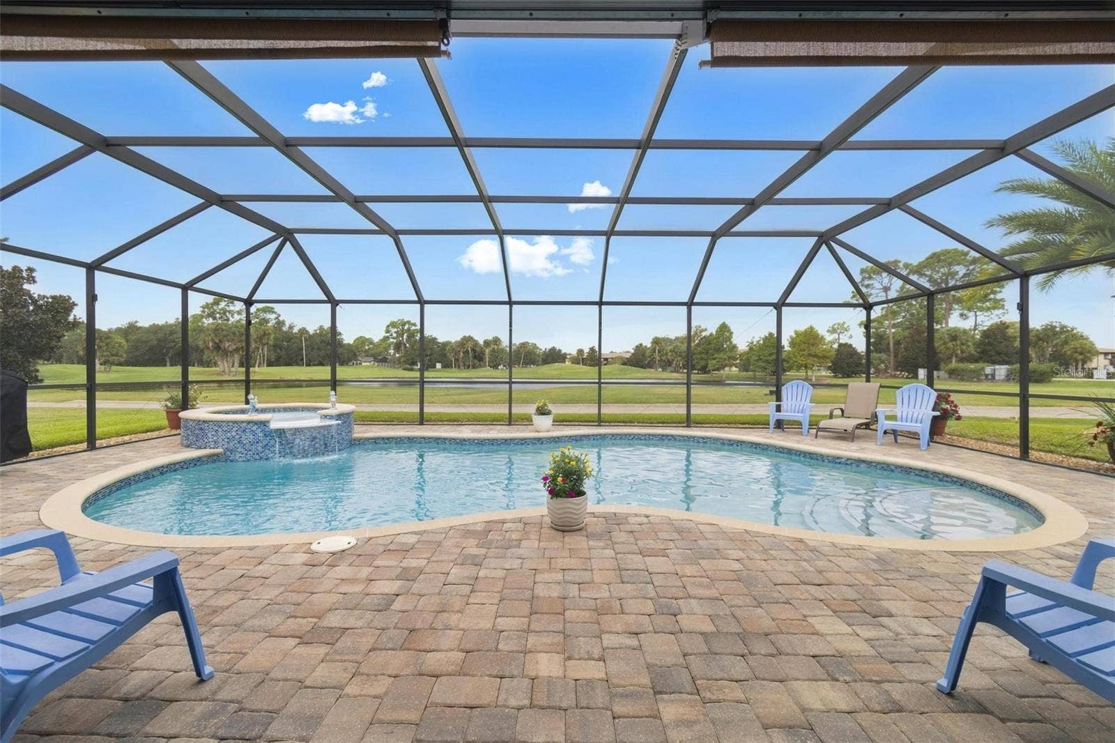 8 COUNTRY CLUB HARBOR CIRCLE, Palm Coast, FL 32137 Saltwater heated pool with deck pavers and spa