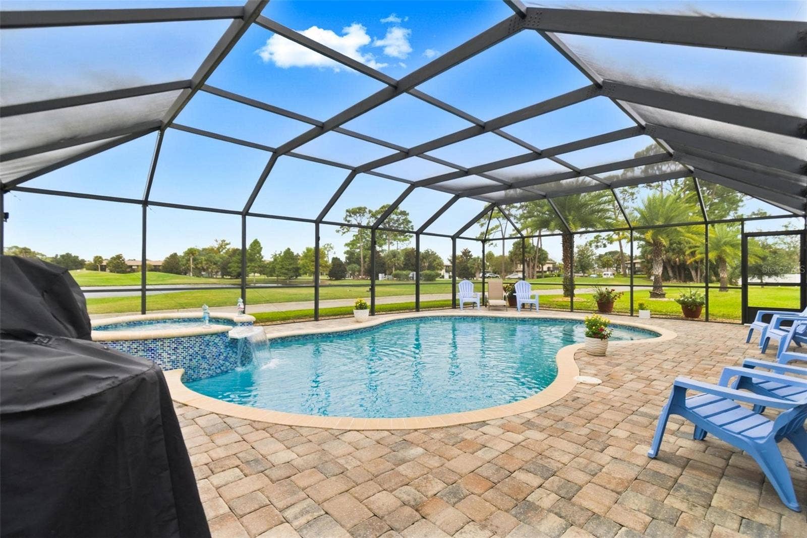 8 COUNTRY CLUB HARBOR CIRCLE, Palm Coast, FL 32137 Saltwater heated pool