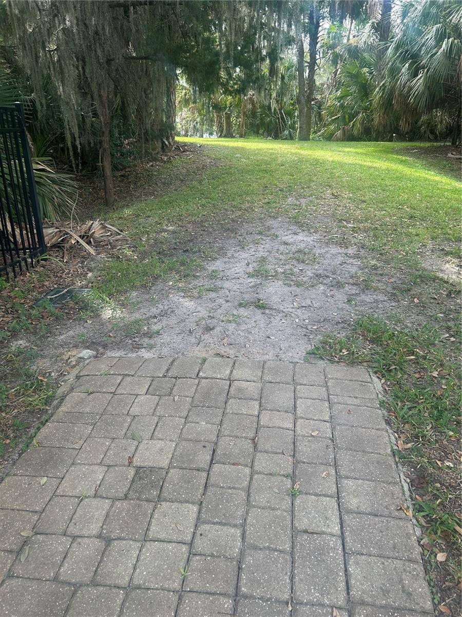 8 COUNTRY CLUB HARBOR CIRCLE, Palm Coast, FL 32137 Pathway to pier and kayak launch