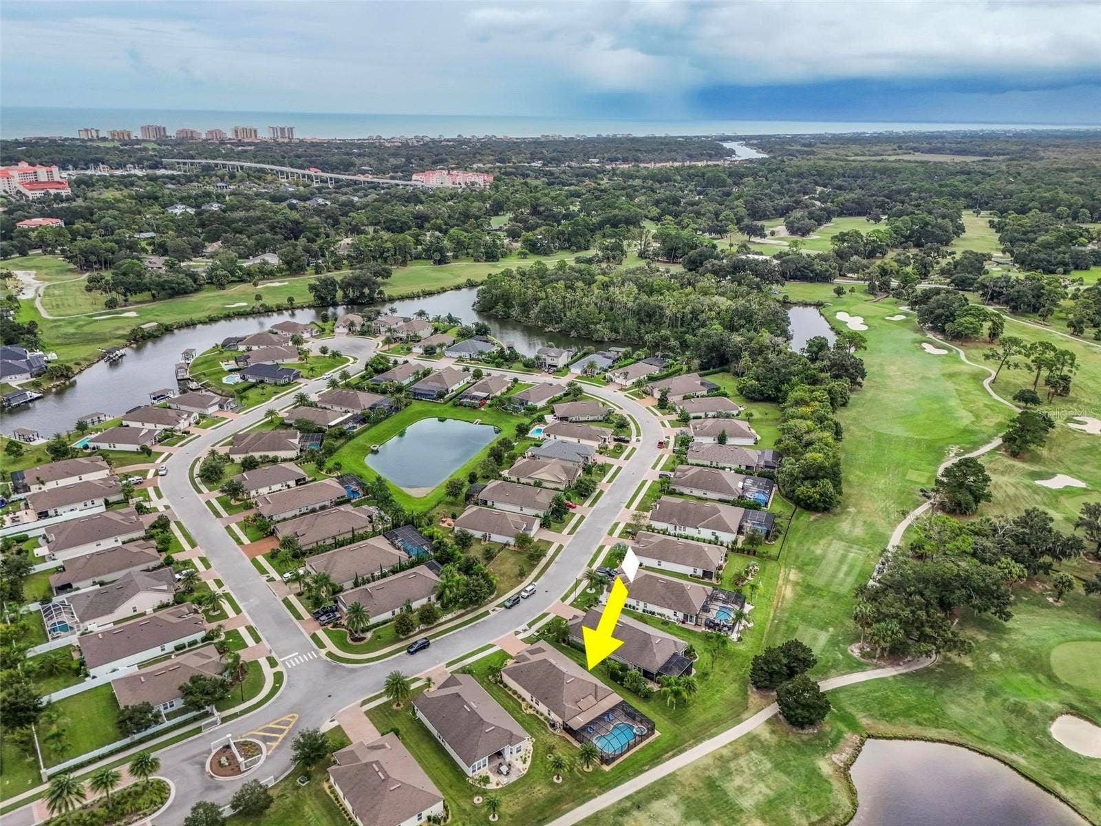 8 COUNTRY CLUB HARBOR CIRCLE, Palm Coast, FL 32137 Aerial view facing east to European Village, the Atlantic Ocean and Hammock Beach