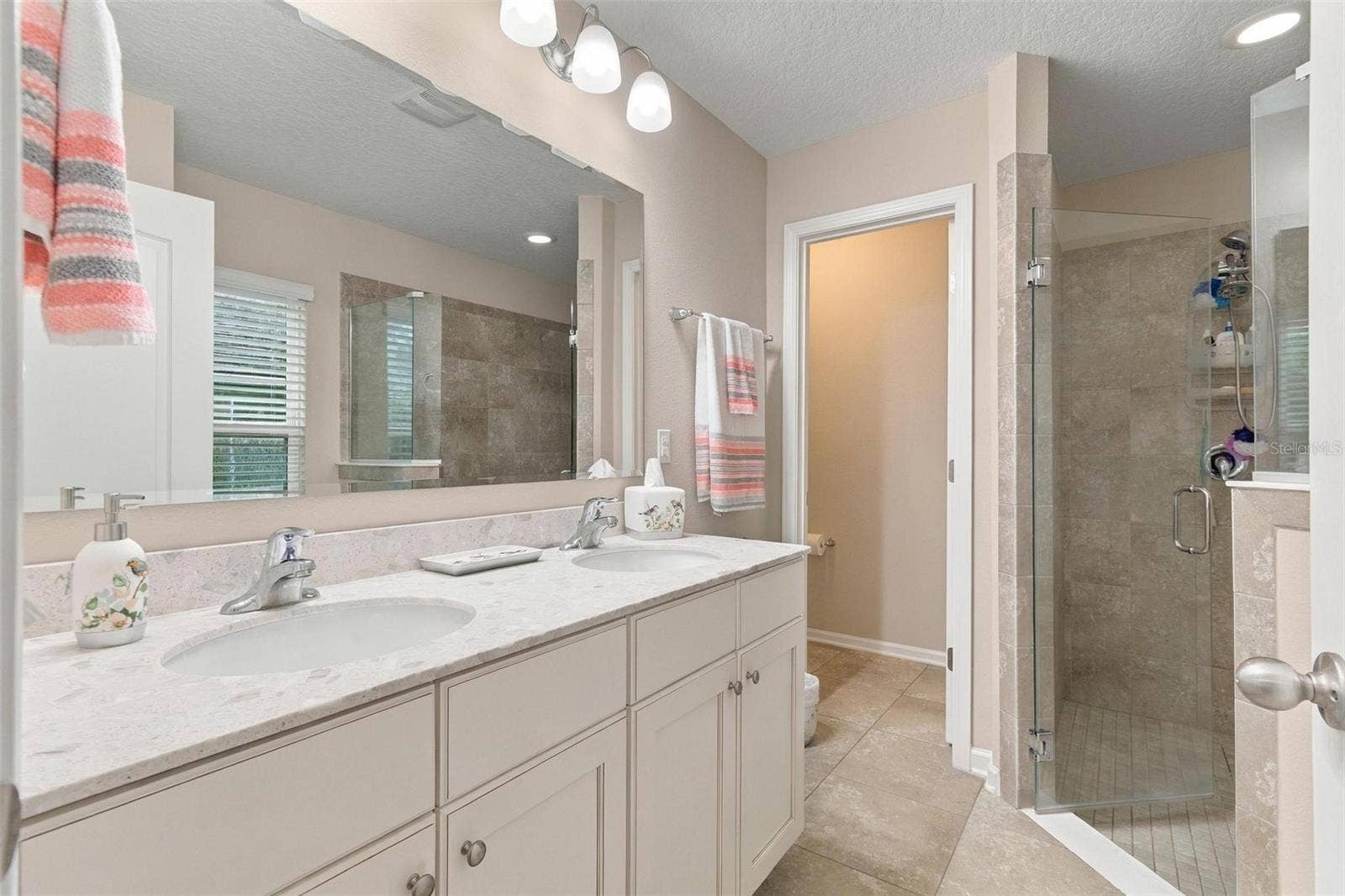 8 COUNTRY CLUB HARBOR CIRCLE, Palm Coast, FL 32137 Separate shower stall and WC in primary bathroom 2