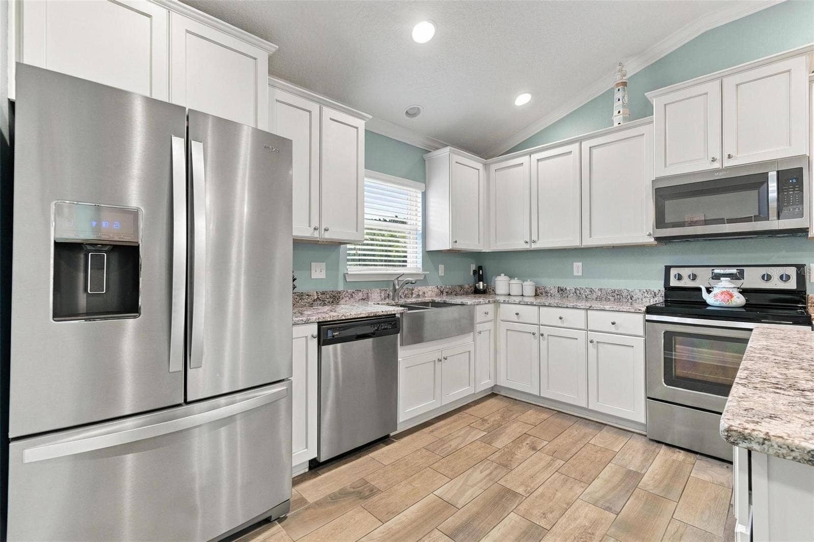 8 COUNTRY CLUB HARBOR CIRCLE, Palm Coast, FL 32137 Tile floors throughout living areas (kitchen, great room, entryway)