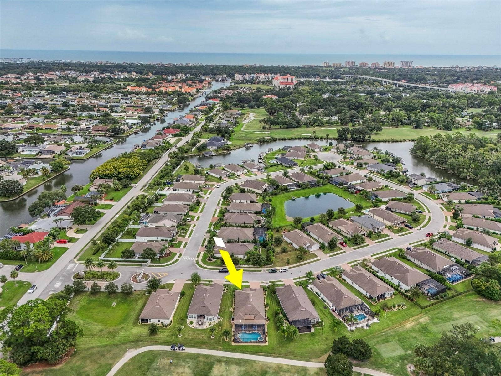 8 COUNTRY CLUB HARBOR CIRCLE, Palm Coast, FL 32137 Aerial view facing east to European Village, the Atlantic Ocean and Hammock Beach