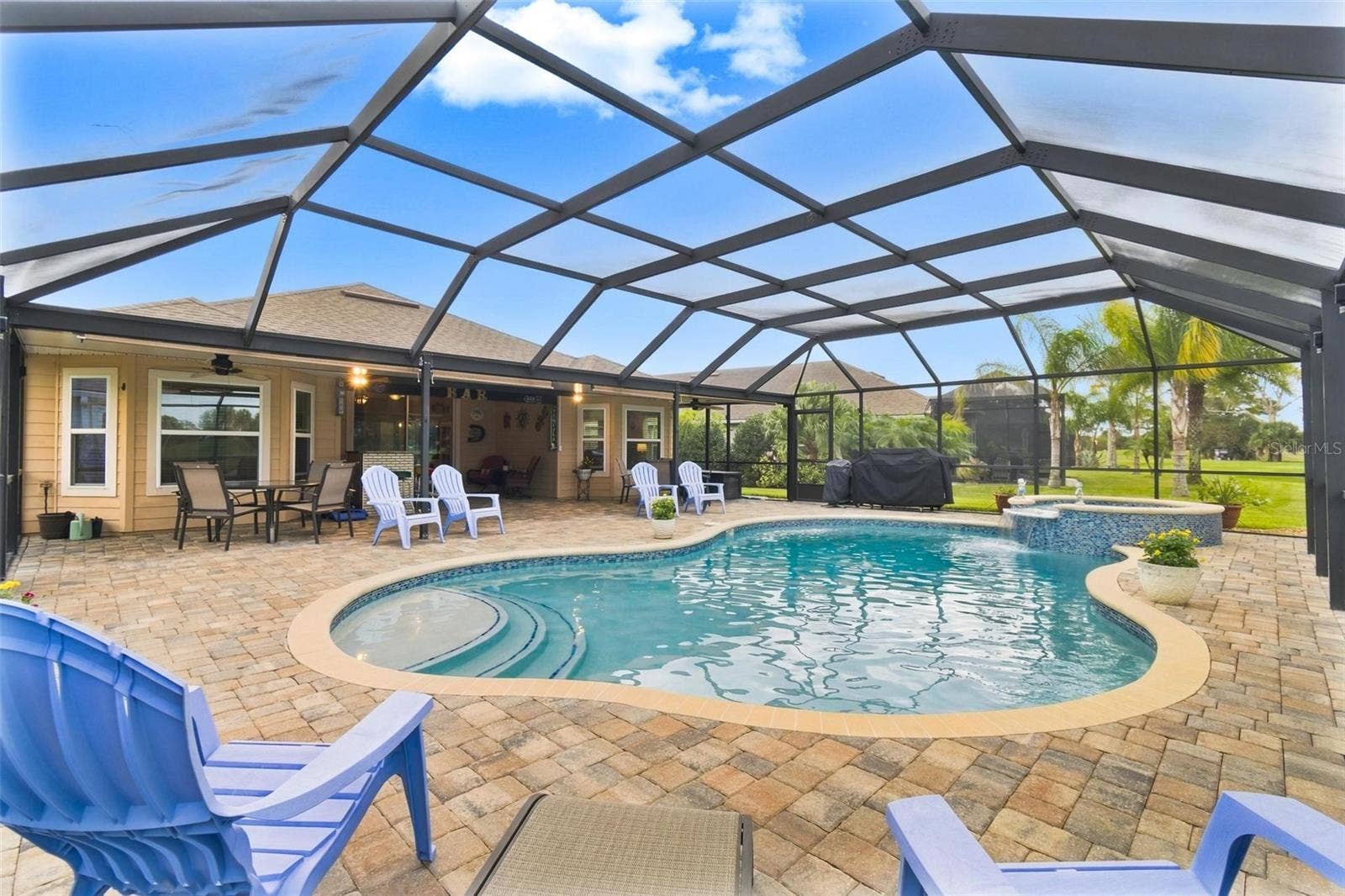8 COUNTRY CLUB HARBOR CIRCLE, Palm Coast, FL 32137 Saltwater heated pool with deck pavers
